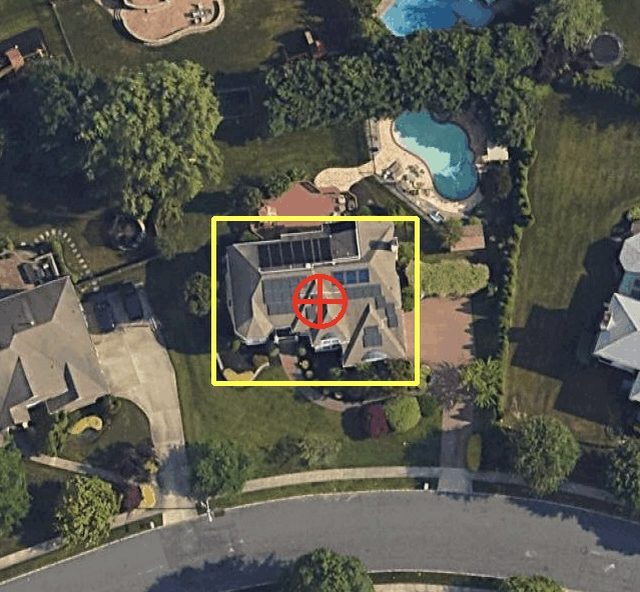 Aerial image of a suburban property with solar on the roof