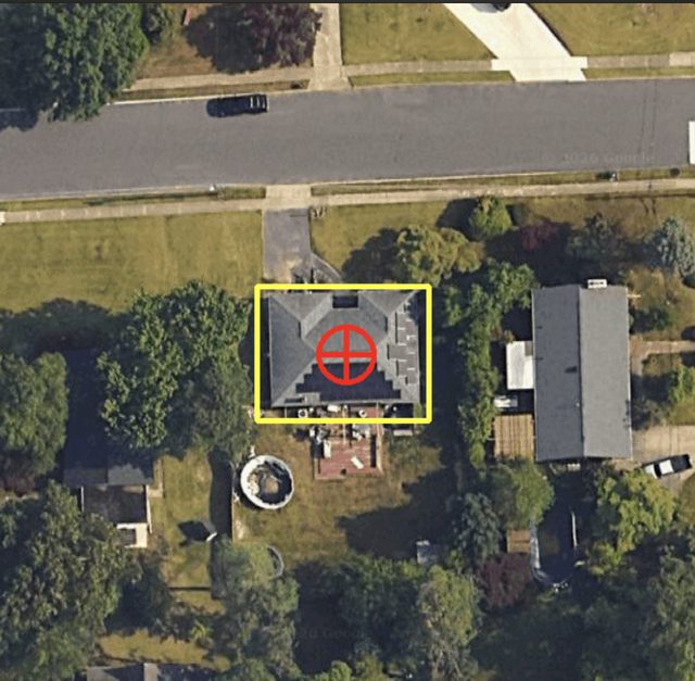 Aerial image of a rural property with solar on the roof