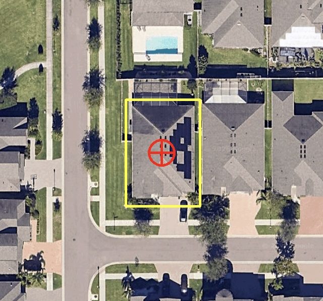 Aerial image of a property in a residential development with solar on the roof